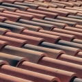 Is it ok to put a new roof over an old one?